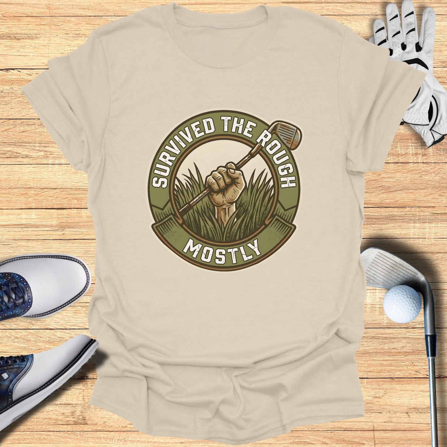 Golf t-shirt with a circular logo of a hand holding a golf club out of grass.