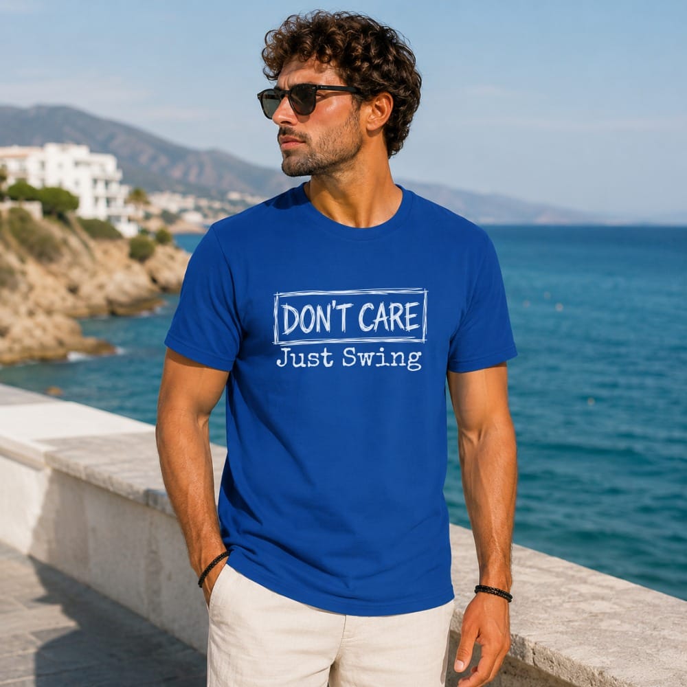 Man wearing a blue t-shirt with "Don't Care Just Swing" text.