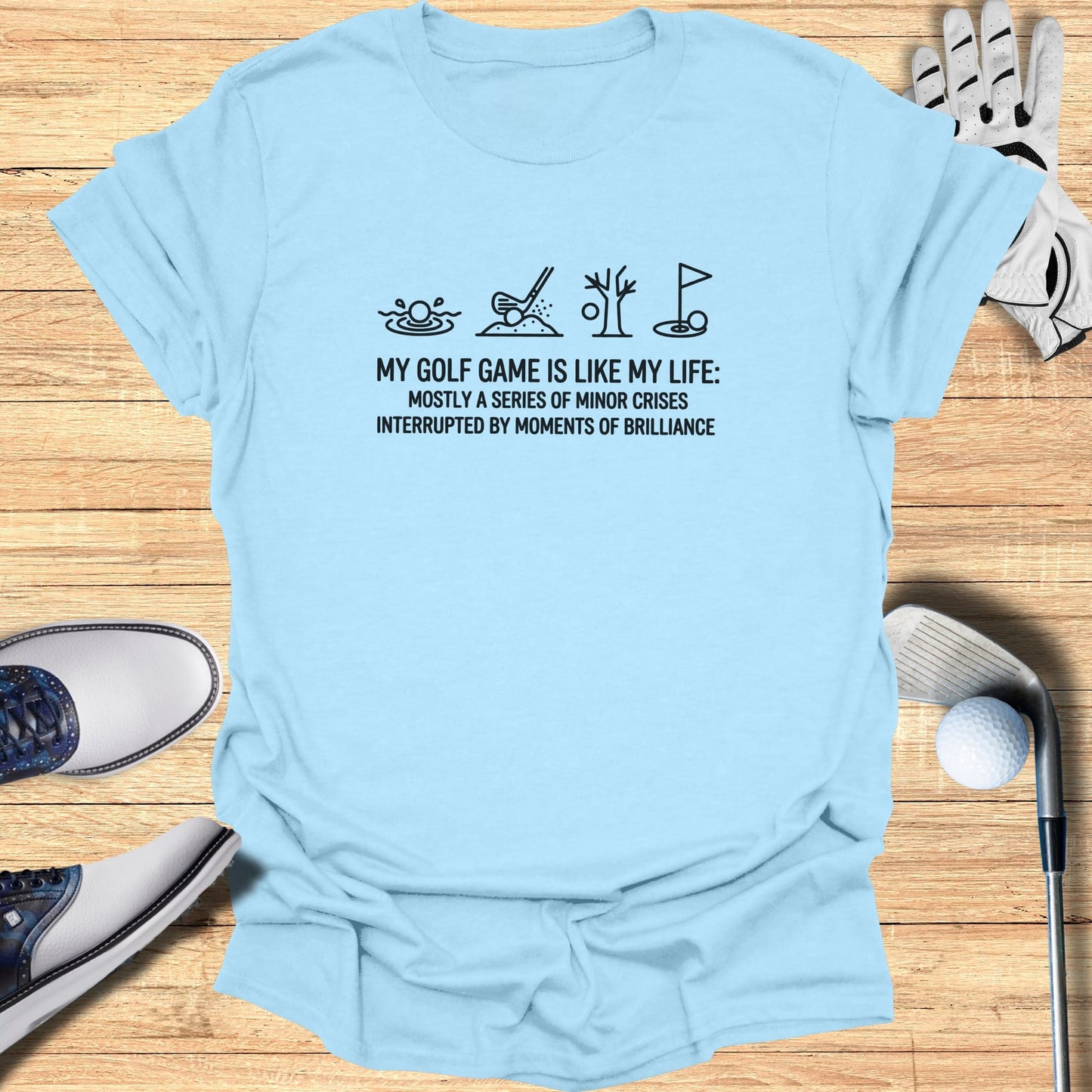 Light blue t-shirt with text about golf and life.