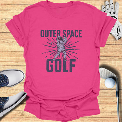 Pink t-shirt with "Outer Space Golf" text and astronaut graphic.