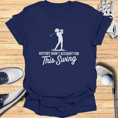 Navy t-shirt with white text and golf silhouette: "History Didn't Account for This Swing."