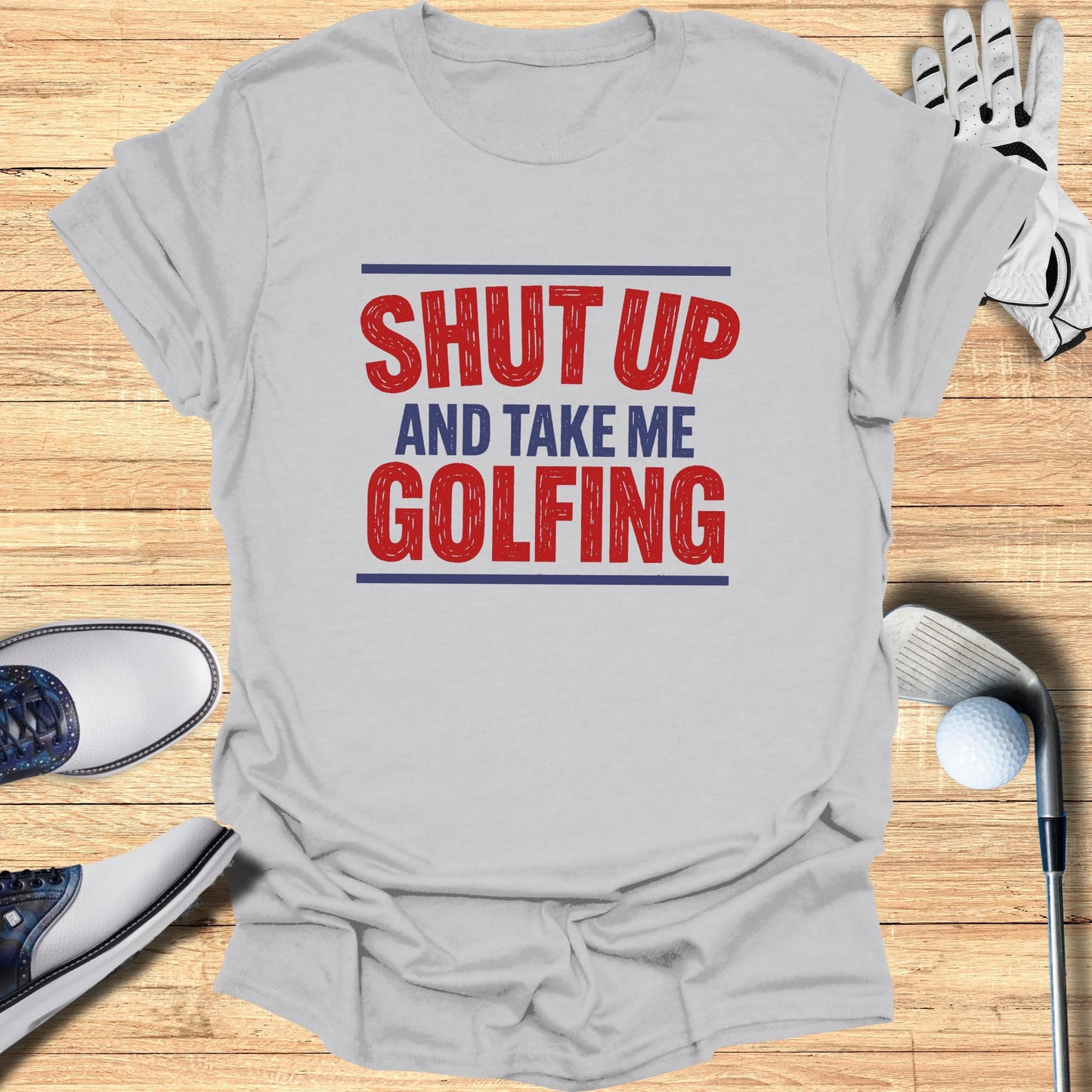 Gray t-shirt with bold red text: "SHUT UP AND TAKE ME GOLFING".