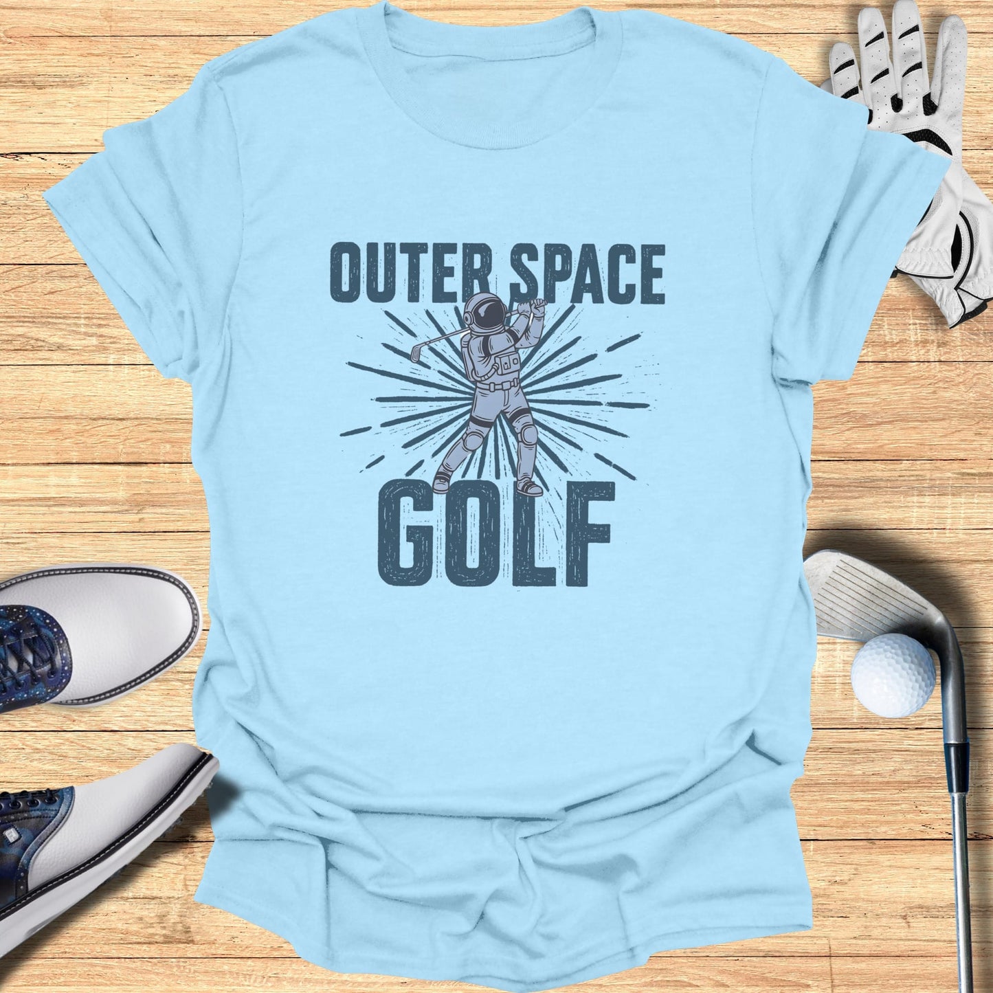 Light blue t-shirt with "Outer Space Golf" text and astronaut illustration.