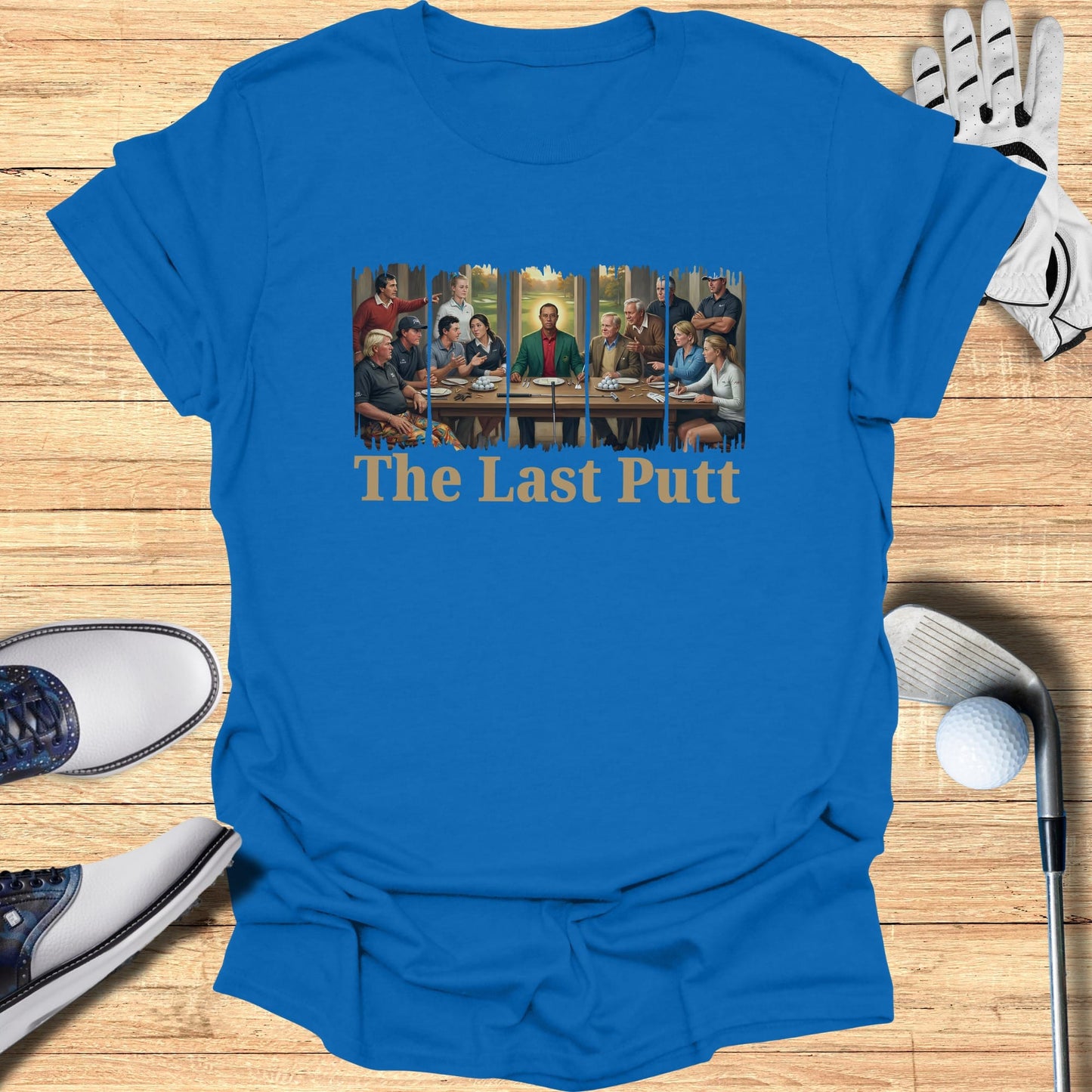 T-shirt with a painting of golfers at a table, text reads "The Last Putt".
