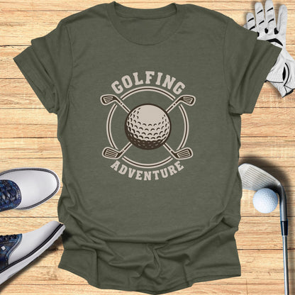 Golfing Adventure logo with crossed clubs, golf ball, and glove on shirt.