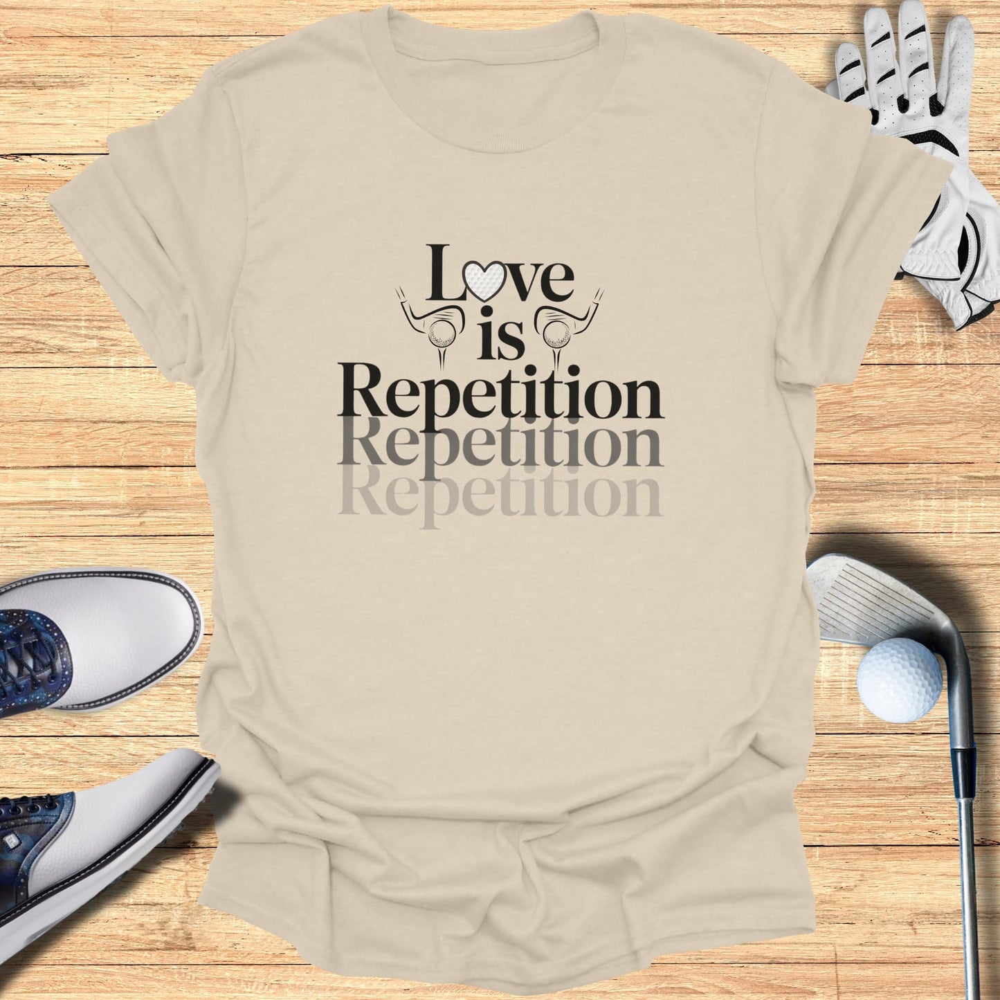 T-shirt with "Love is Repetition Repetition Repetition" text and golf items.