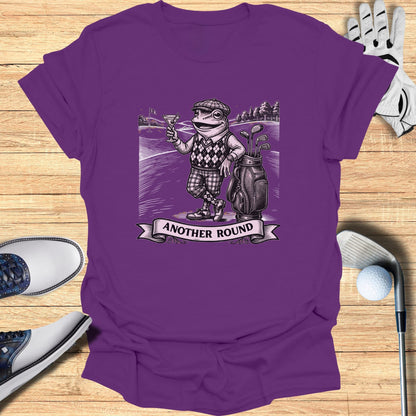 Purple t-shirt with a cartoon frog golfer holding a martini glass and a golf bag.