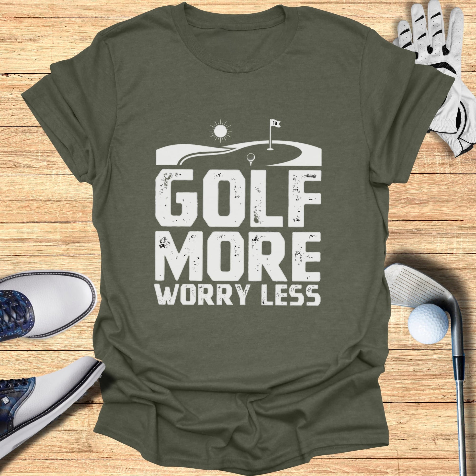 T-shirt with "Golf More Worry Less" text and golf imagery.