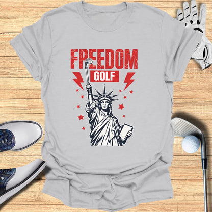 Statue of Liberty holding golf club and book, "Freedom Golf" text.