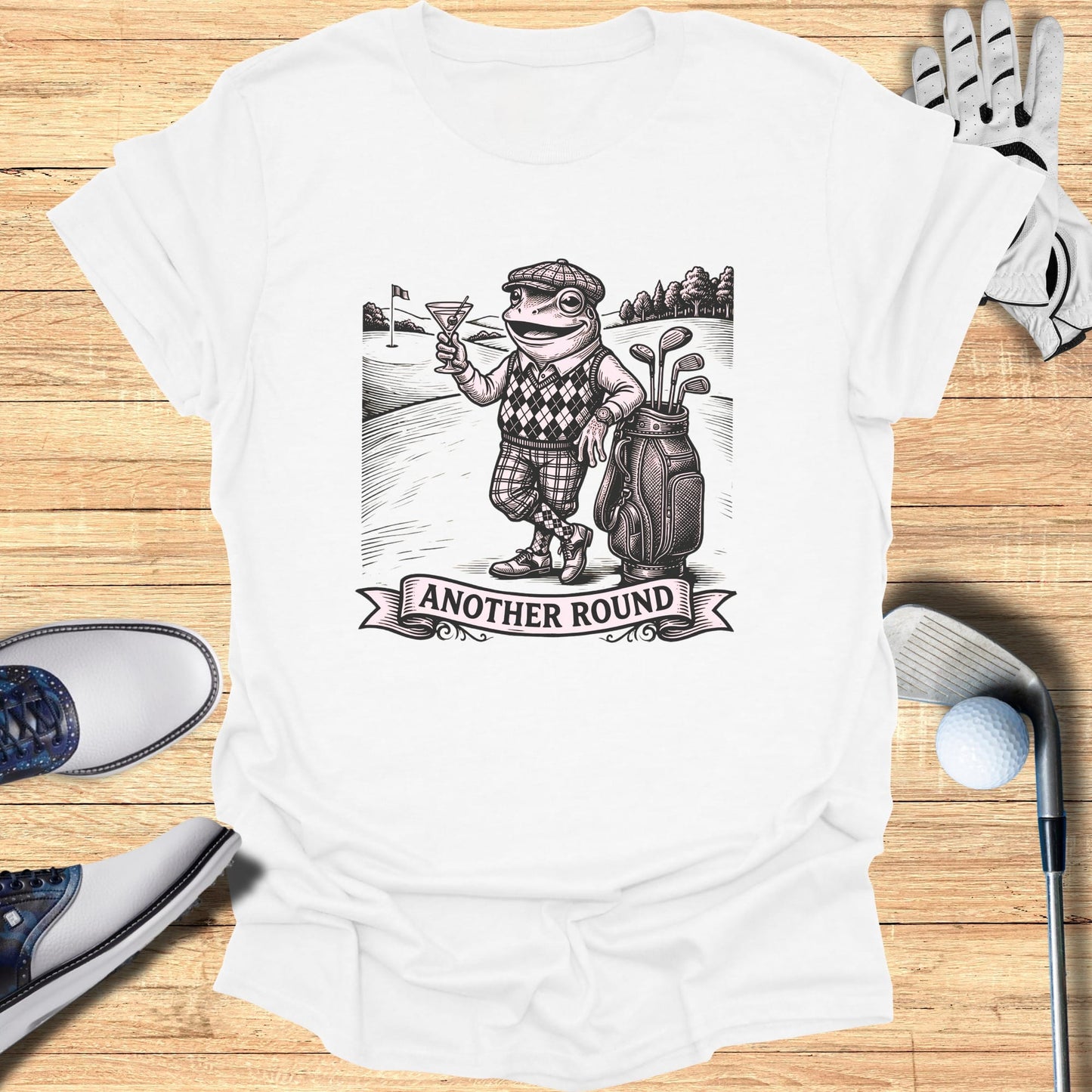 T-shirt with sketch of a frog in golf attire holding a martini.