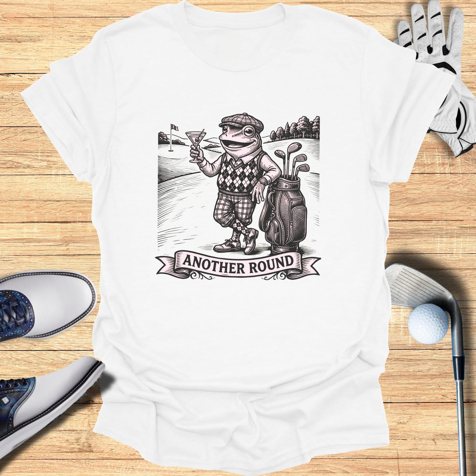 T-shirt with sketch of a frog in golf attire holding a martini.