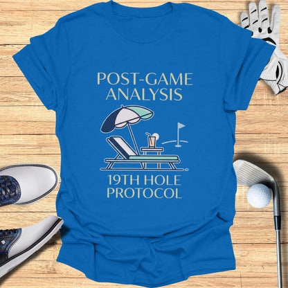 Blue t-shirt with "POST-GAME ANALYSIS 19TH HOLE PROTOCOL" text and golf illustration.