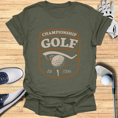 T-shirt with "Championship Golf Est. 1990" graphic and golf items.