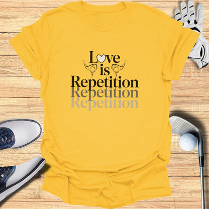 Yellow t-shirt with "Love is Repetition Repetition Repetition" text and golf accessories.
