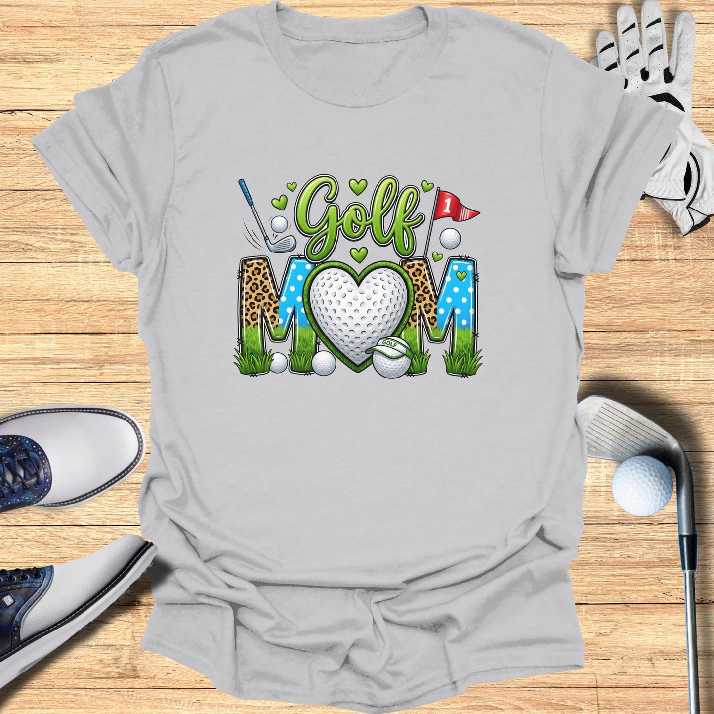 Golf Mom graphic with heart, golf ball, and leopard print accents.