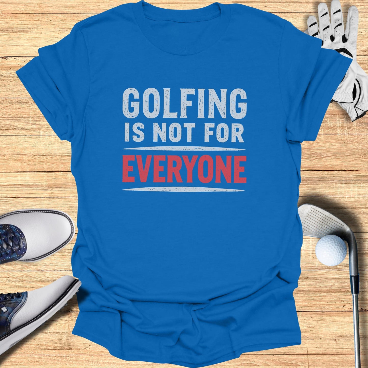 Blue t-shirt with white text "GOLFING IS NOT FOR EVERYONE" in red.