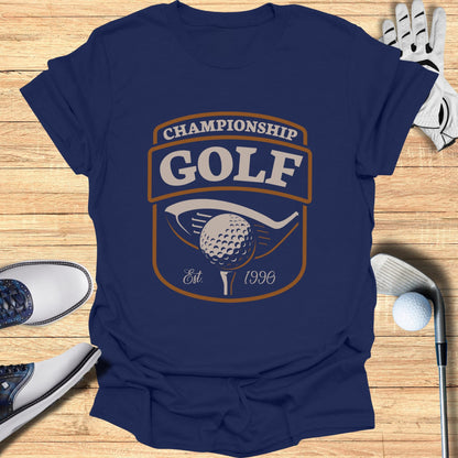 Navy t-shirt with "Championship Golf" logo featuring a golf ball and club.